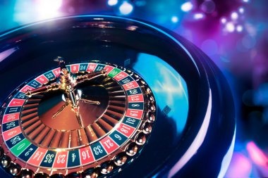 Multi-camera live studio setup for Casino Hold'em showing dealer, table, and card distribution